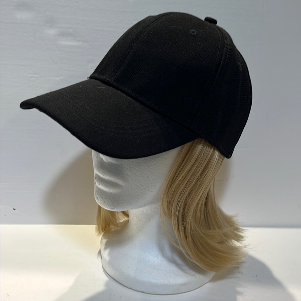 Black Baseball Cap with attached blonde extension never used.